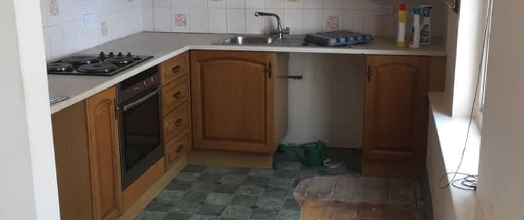 picture of a traditional kitchen in a bad condition before repair